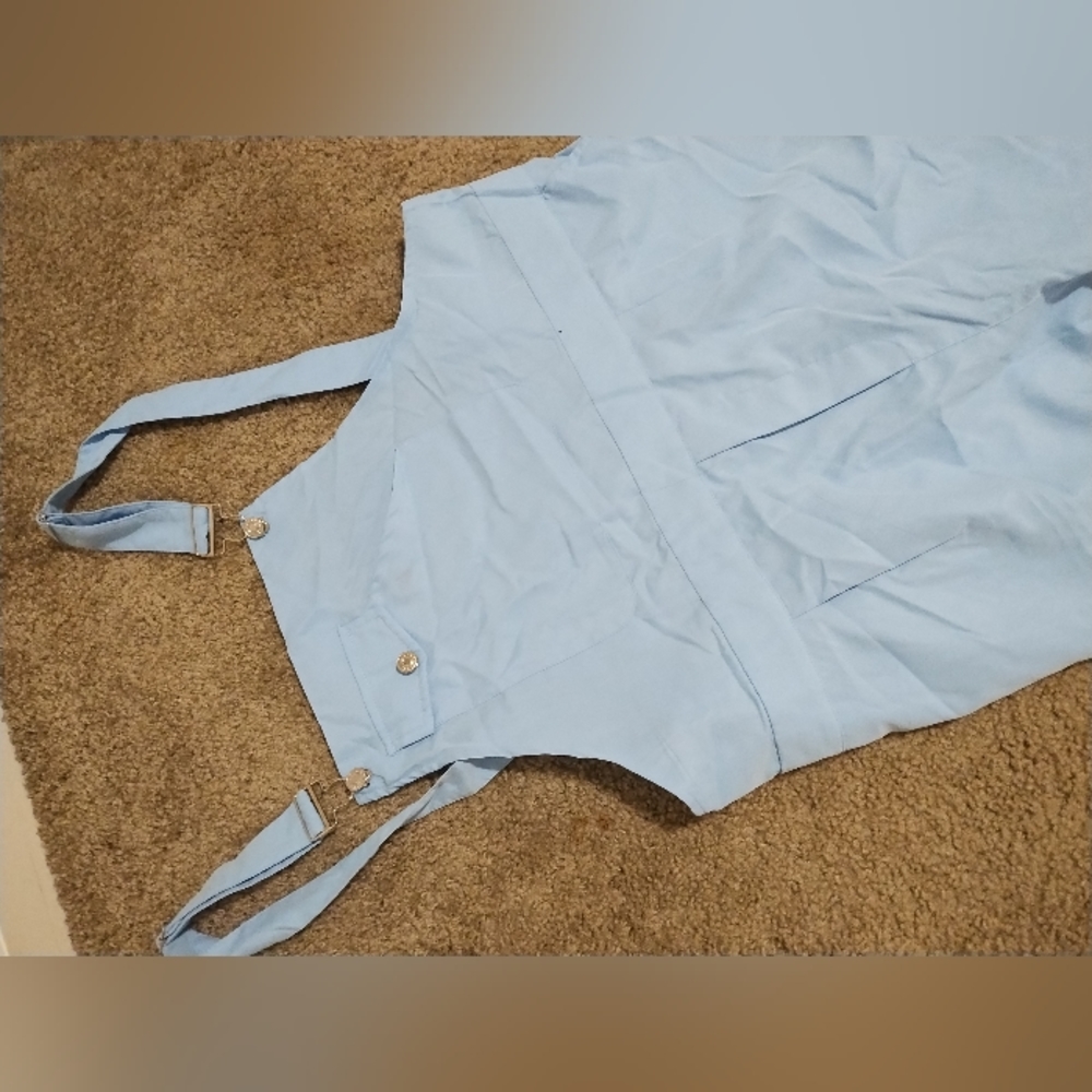 A baby blue overalls,thin